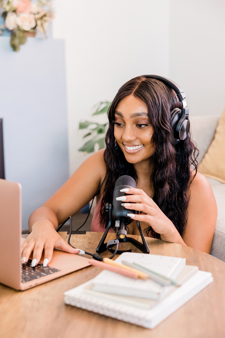 Woman Recording a Podcast in Her Living Room